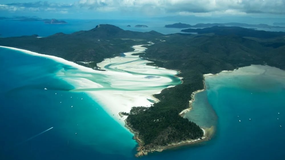 an aerial view of an island in the ocean