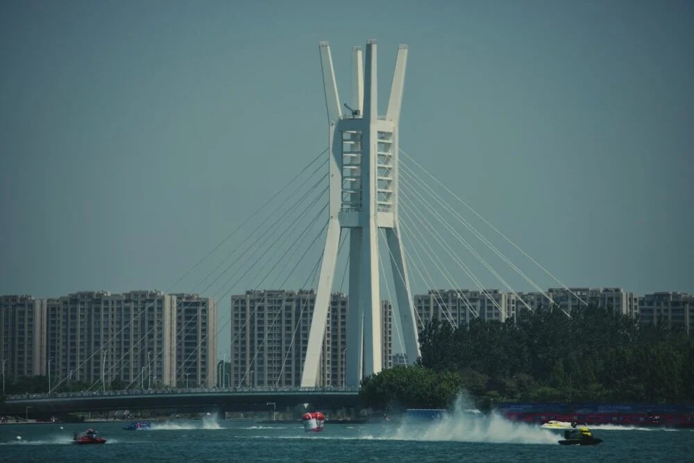 a large white bridge over a body of water