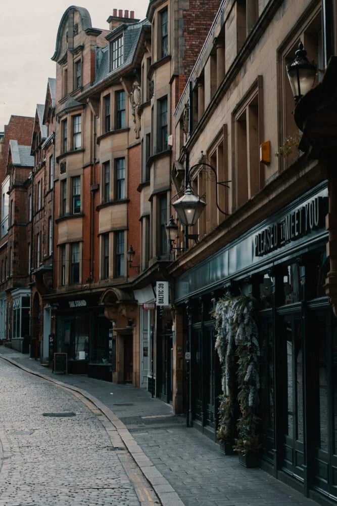 brown concrete building under white sky
