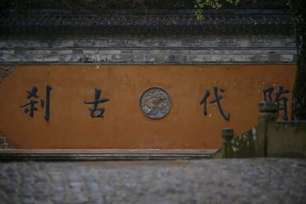 a clock that is on the side of a building