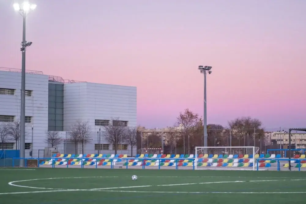 a soccer field in front of a building