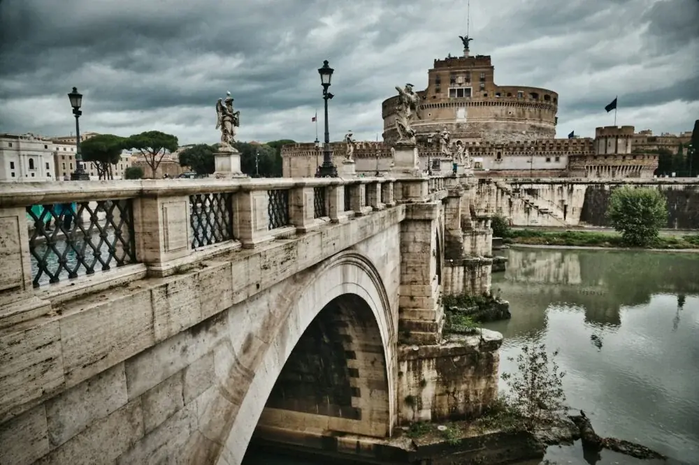 brown concrete bridge over river during daytime