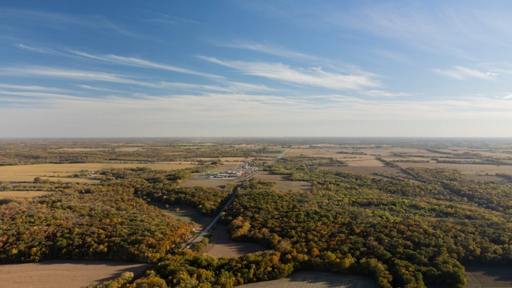 an aerial view of a rural area with lots of trees